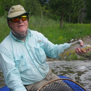 Muddy water, but still hitting a Royal Wulff on the Smith.