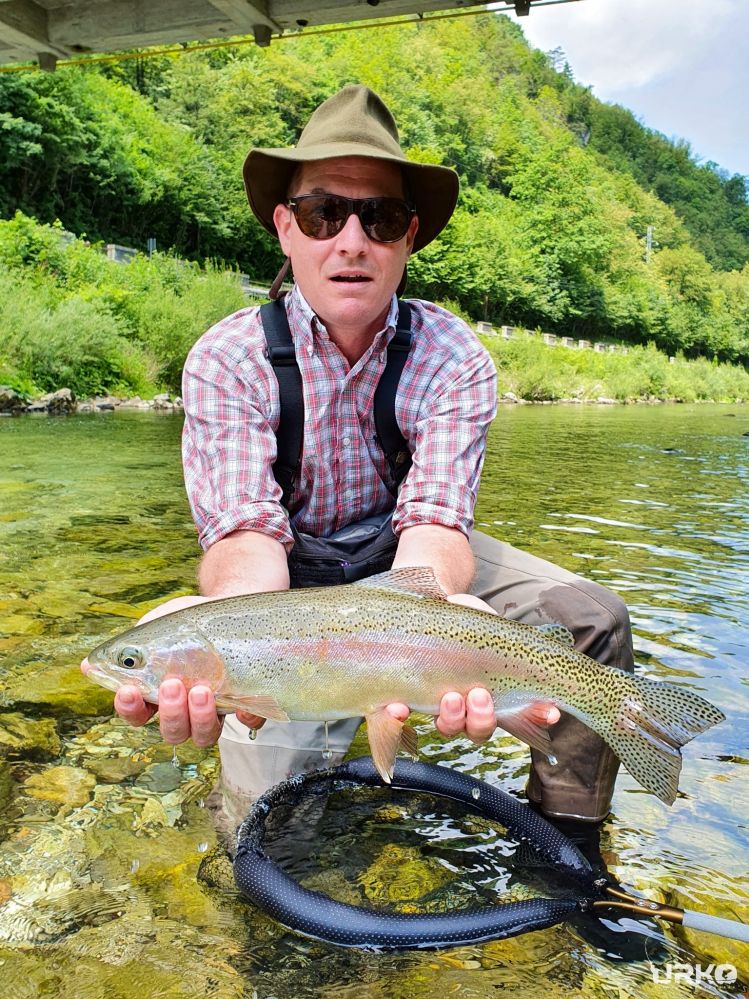 Niko with a fantastic rainbow trout, and just one of many that day