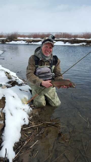 Cold day in February wyoming rainbow spent the morning ice fishing for dinner and the afternoon fly fishing on the river a winter wonderland