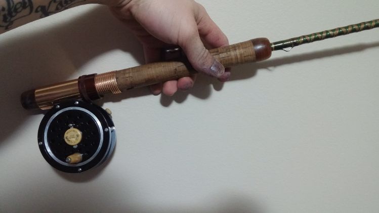 Bought an old fly rod with a pflueger medalist reel. Reel was in rough shape so i disassembeled it sanded and painted it and it cleaned up nicely and works like a charm it will make a nice little 4 weight 5' 6" stream rod!
