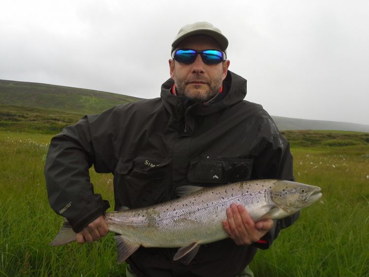 Happy client with salmon from Mýrarkvísl